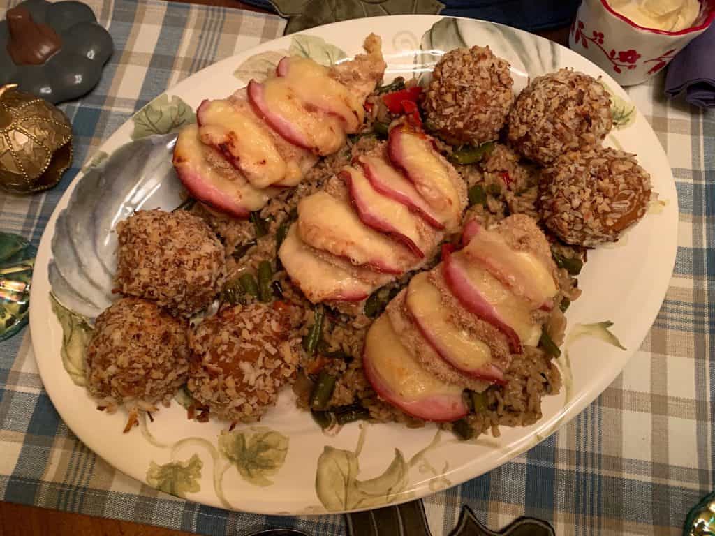 sweet potatoes on a platter with chicken